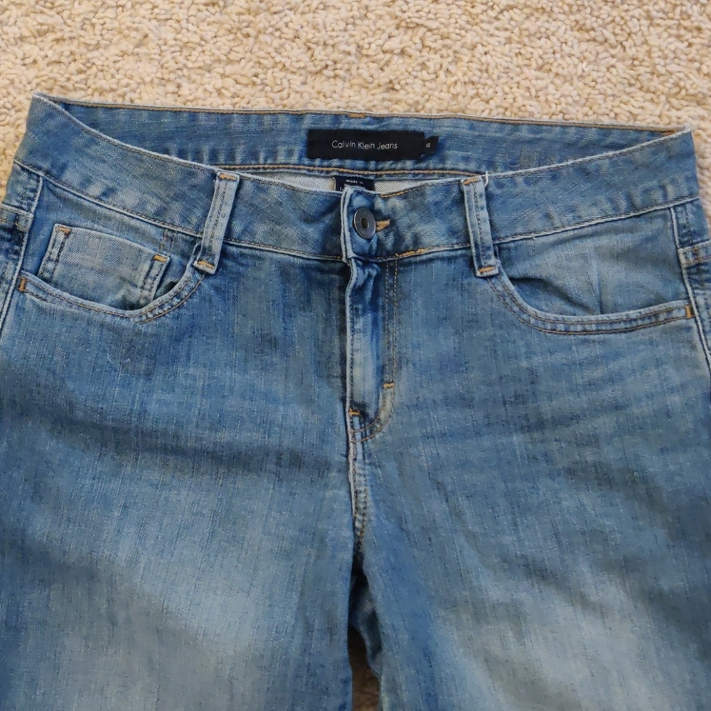 Calvin Klein medium wash boot cut jeans